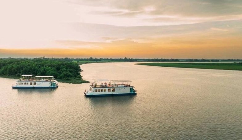 Luxury River Cruise Boat on the Ganges at Sunset